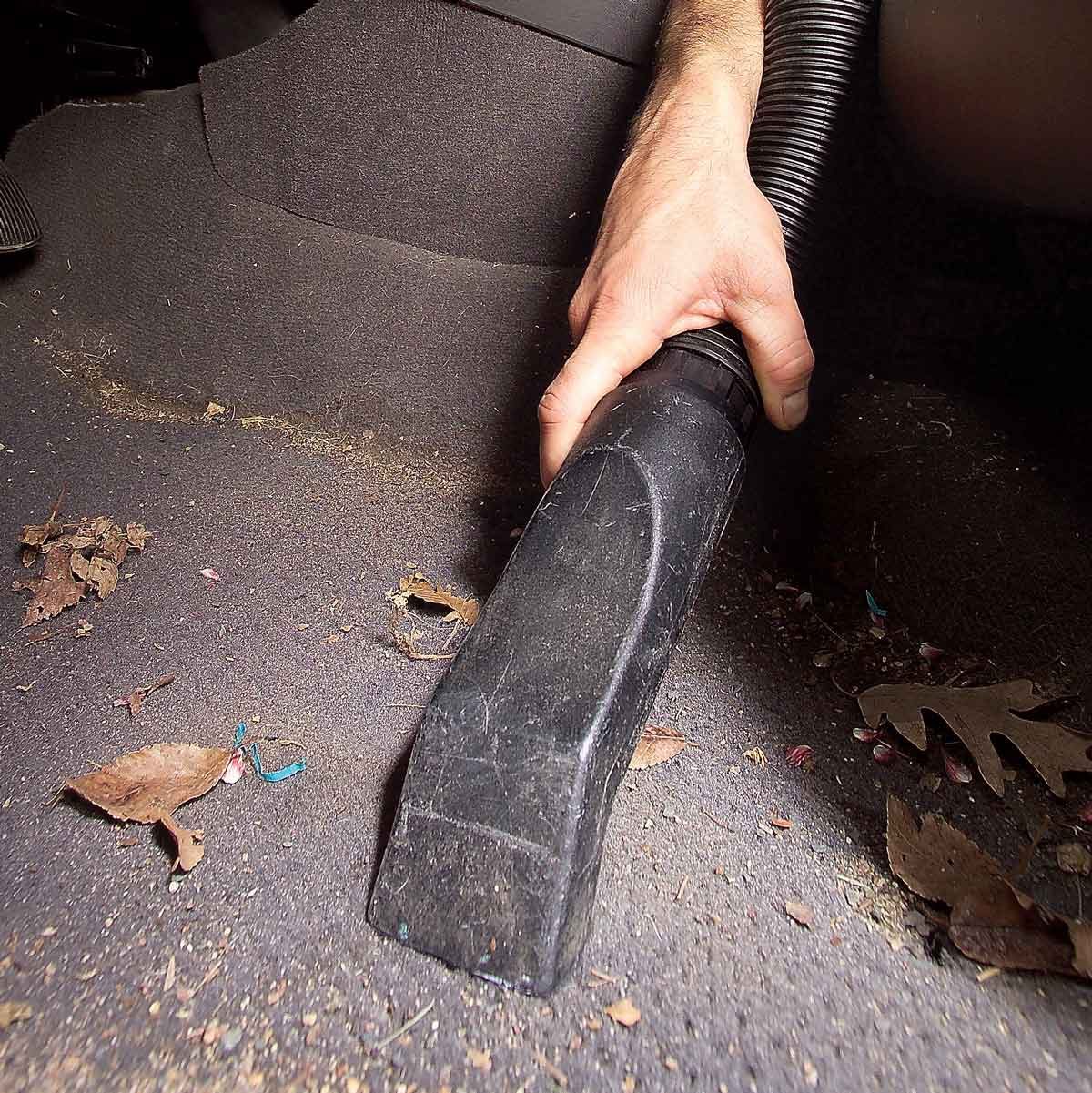 Best Way to Clean a Car: Slide Seats Forward and Clean Out the Junk