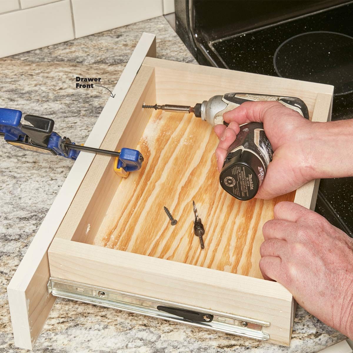attach the under-cabinet drawer front