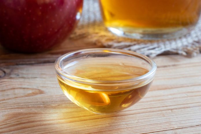 A bowl of apple cider vinegar