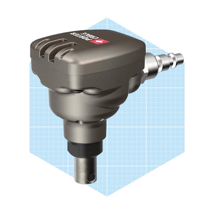 A metallic air tool nozzle attaches to a hose, designed for directing airflow efficiently, set against a light blue grid background.