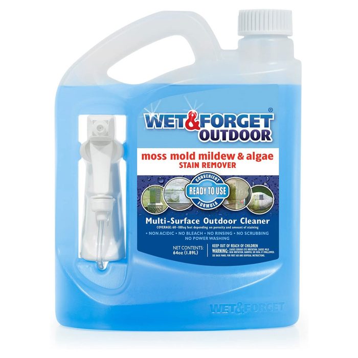 A blue cleaning solution container labeled 