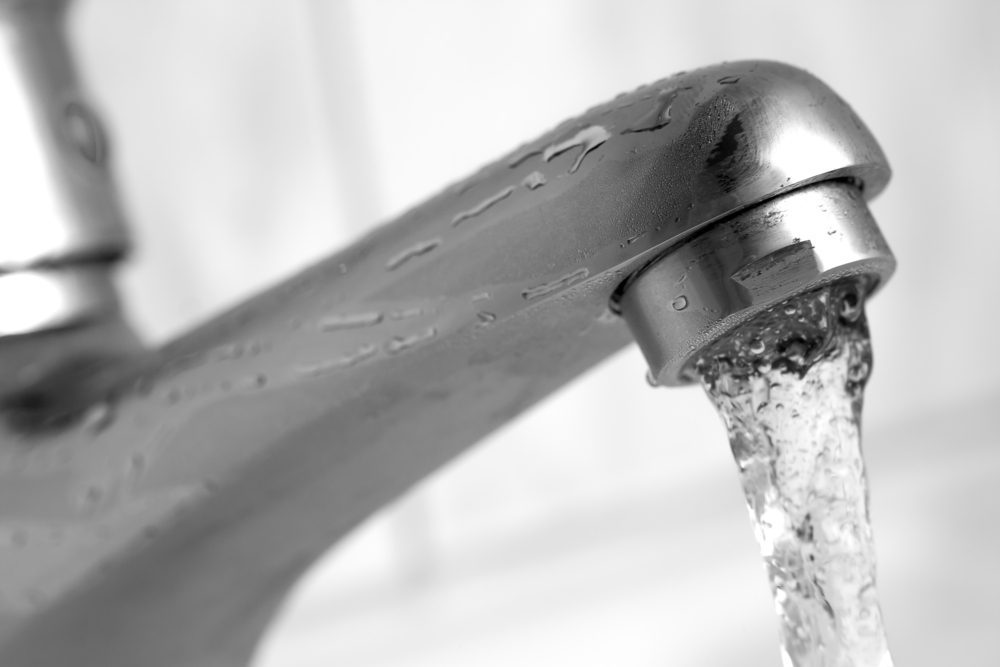 Water Tap With Flowing Water Selective Focus Shallow Depth Of Field