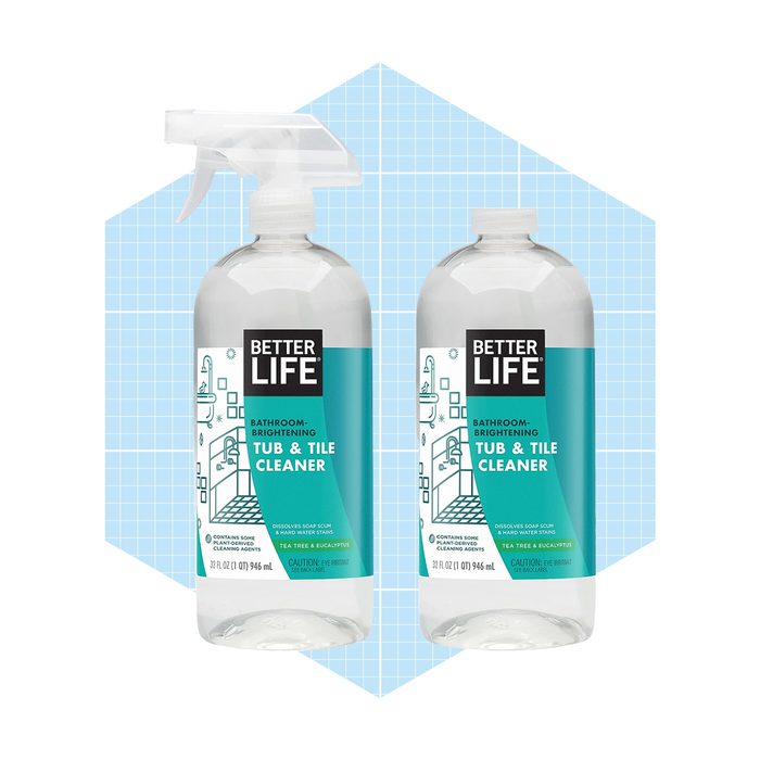 Two spray bottles of cleaner are positioned side by side, labeled 