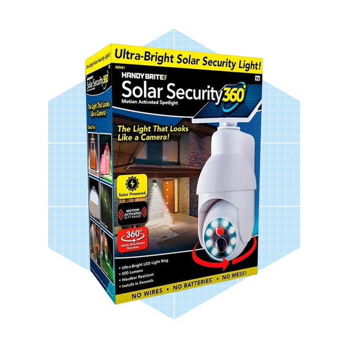 A packaged solar security light showcases its features, emphasizing motion activation and solar power, suitable for outdoor use, designed like a camera for added security.