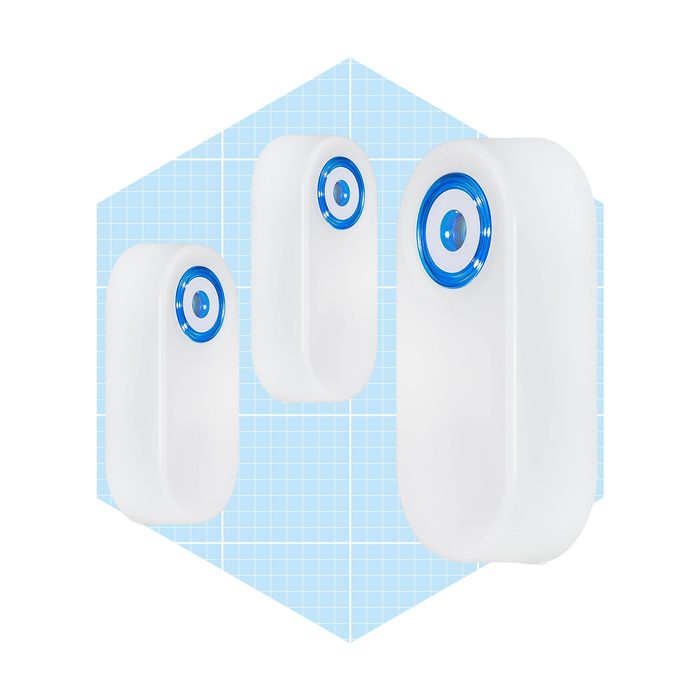Three white devices with blue rings are displayed against a light blue grid background, suggesting a modern and sleek design for functionality.