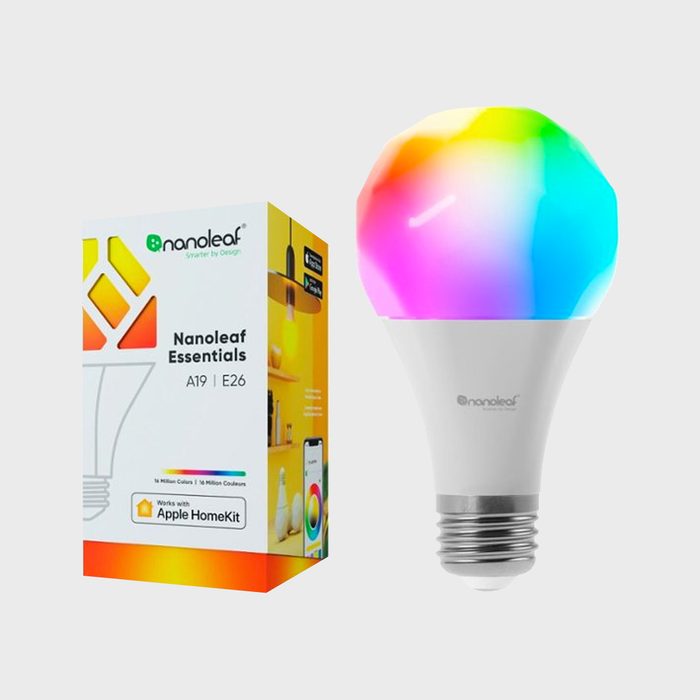 A colorful smart light bulb is displayed next to its box, showcasing a vibrant design and features for color customization and home automation compatibility.