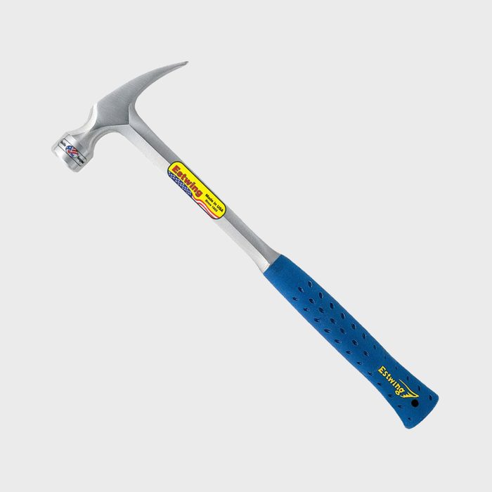 A steel hammer with a curved claw and textured blue rubber handle rests against a plain background, ready for driving nails or removing them.