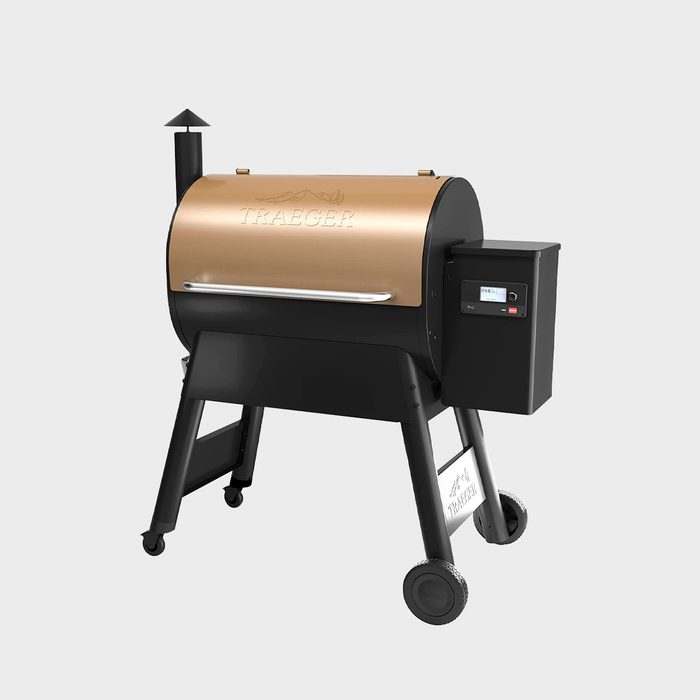 A black and bronze pellet grill stands on wheels, featuring a digitally controlled front panel. It’s designed for outdoor cooking and grilling.