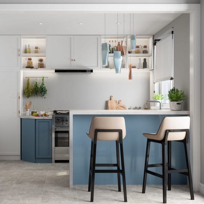 Modern Kitchen Interior With Kitchen Island, Blue And White Cabinets And Chairs