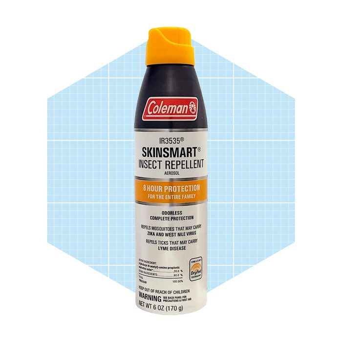 A canister of insect repellent stands upright, labeled for eight-hour protection, set against a light blue grid background.