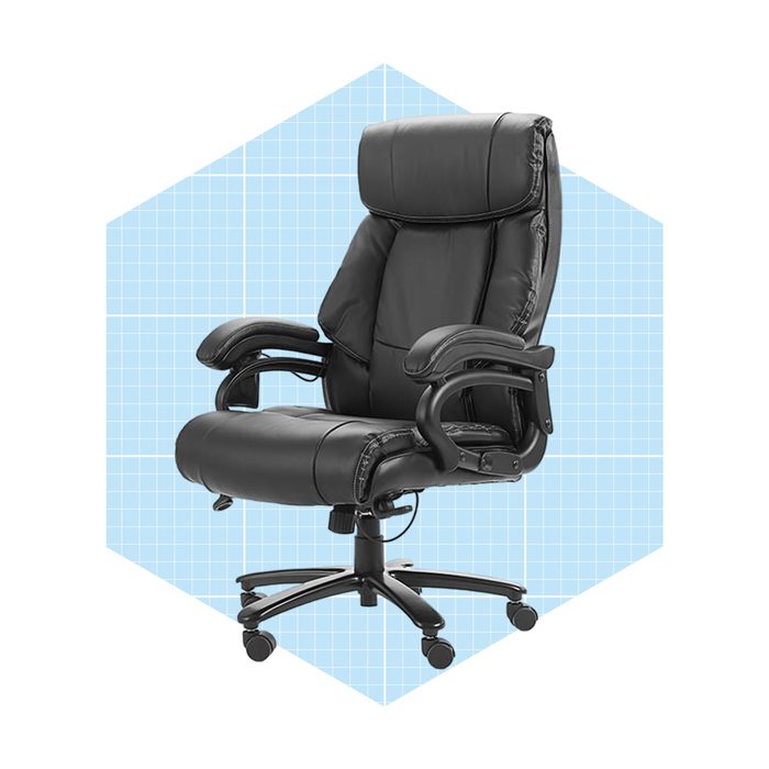 A black leather office chair is positioned prominently. It features adjustable arms and a high back, set against a light blue grid background.