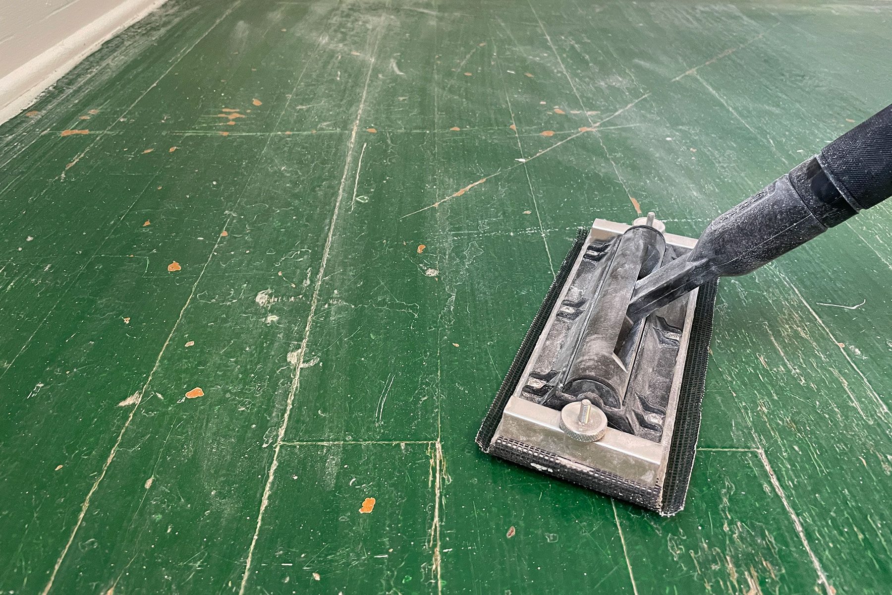 Sanding the floor